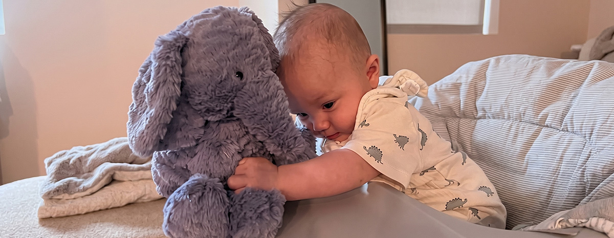 A-heartwarming-atmosphere-featuring-baby-and-a-plush-toy.jpg