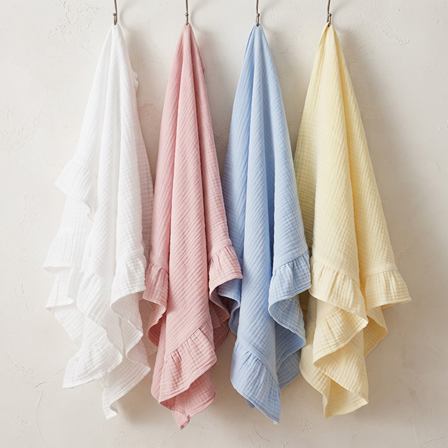 Pastel Color Ruffle Muslin Baby Blanket Collection Hanging Display - Custom Blanket Supplier